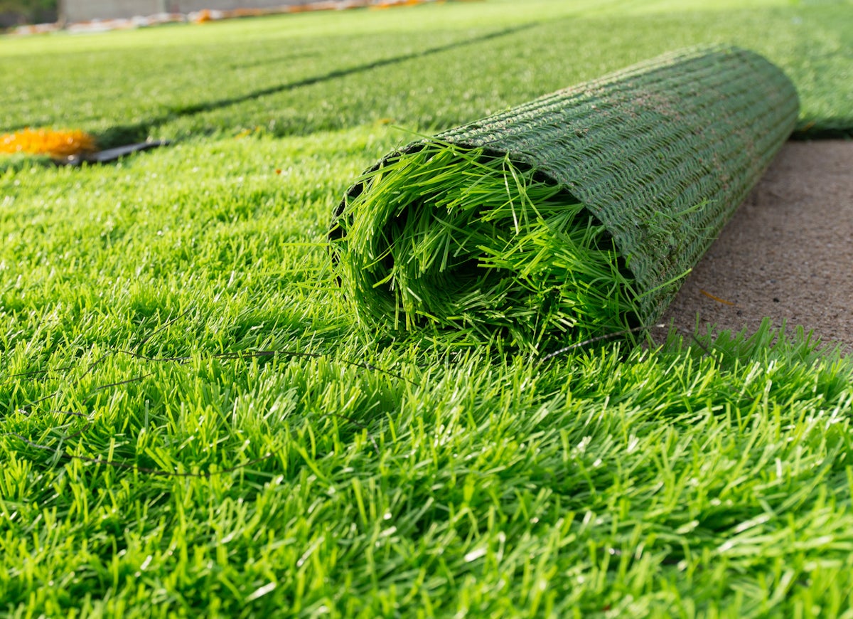 Tour Greens Dallas synthetic turf installation project