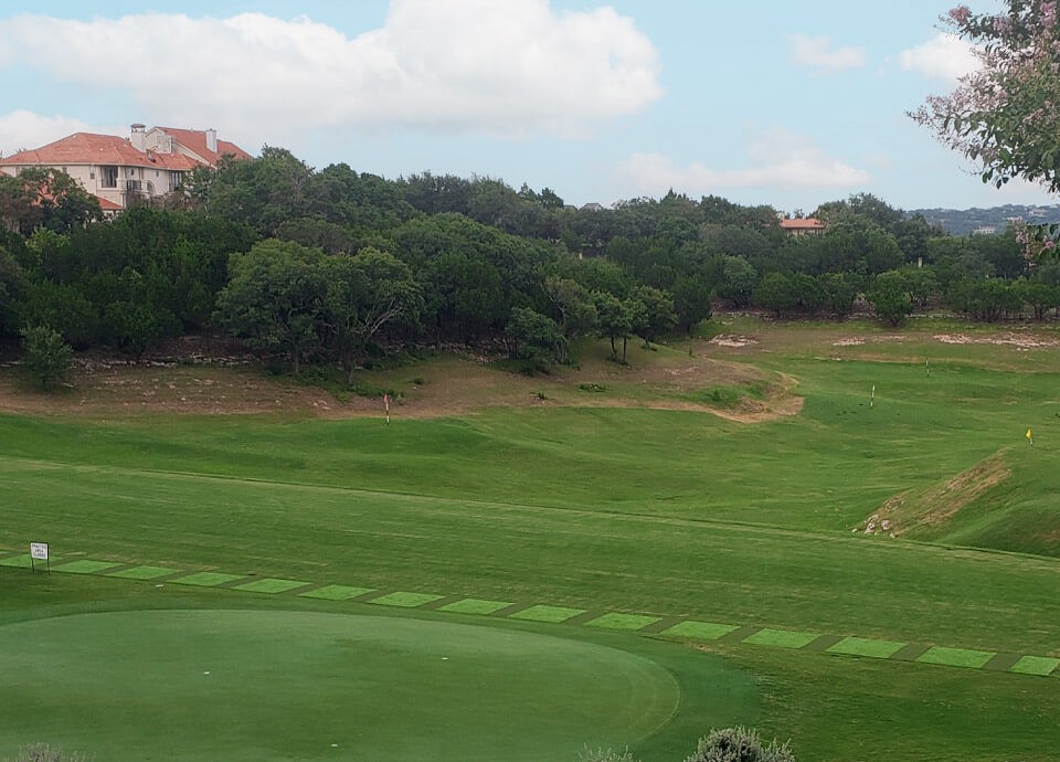 Tour Greens Dallas golf simulator and hitting turf installation