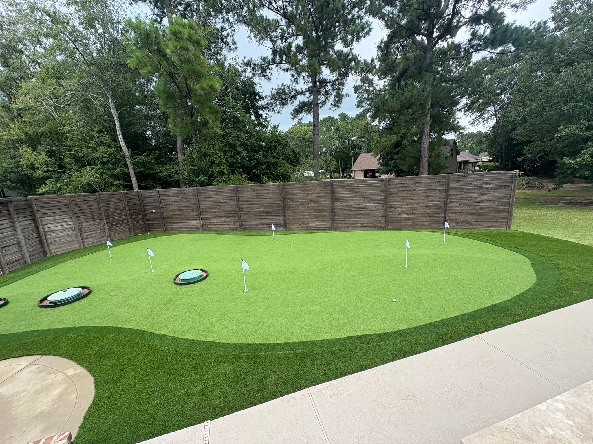 Central Texas family putting green and synthetic fringe installation