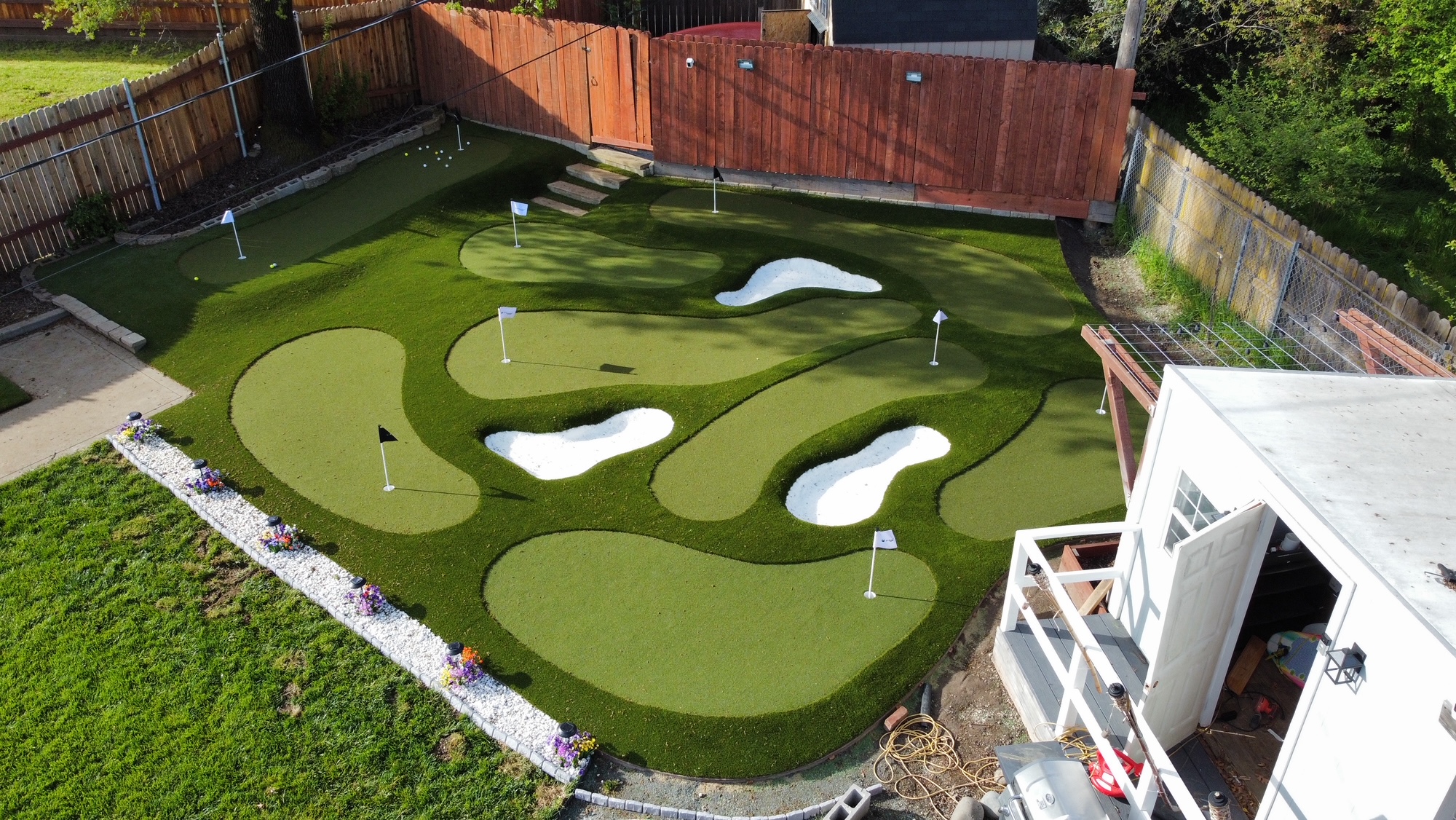 DFW backyard putting green with bunker and chipping area