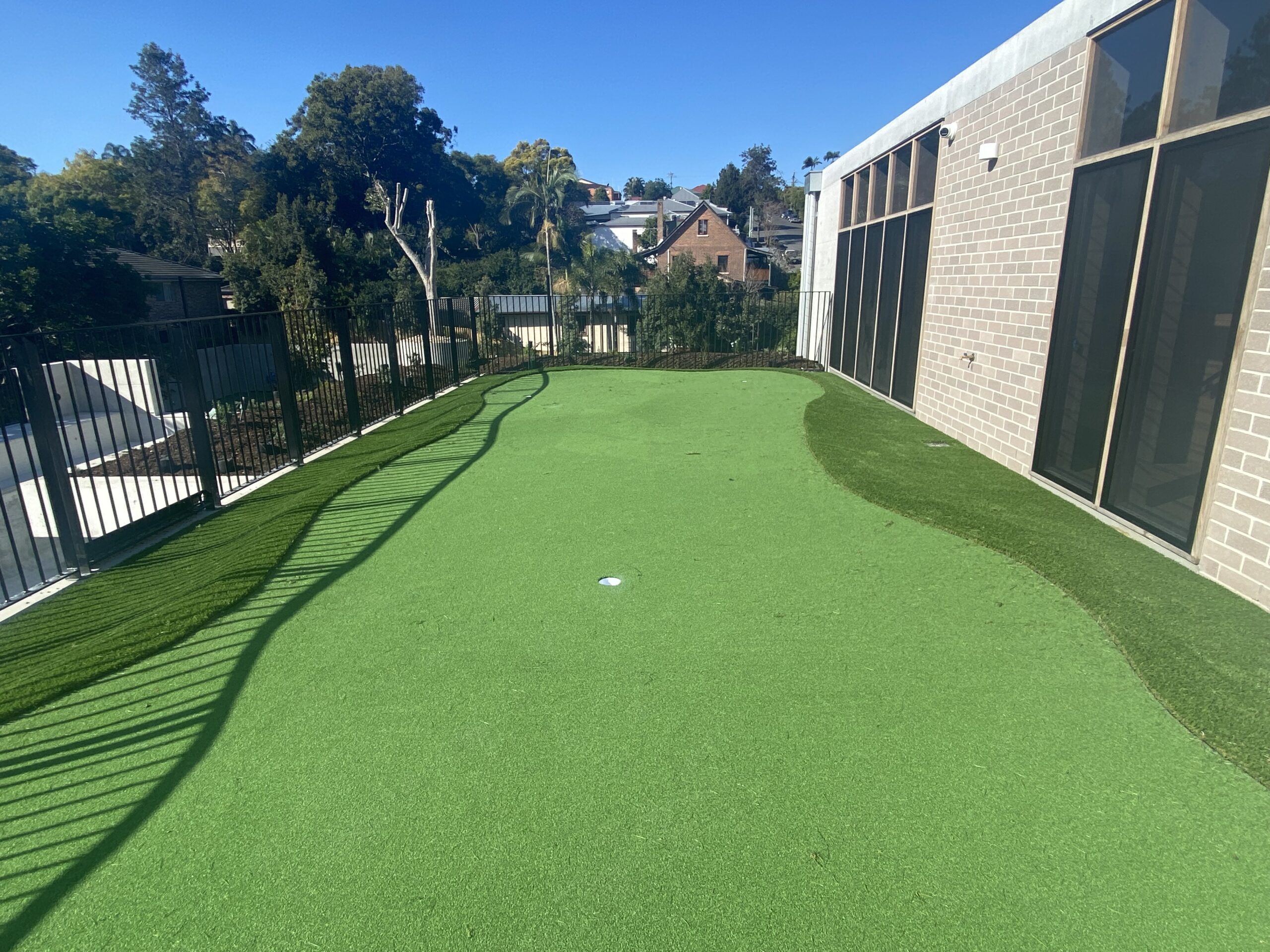 Custom putting green installed at a McKinney, TX property